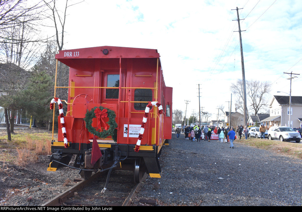 A good sized crowd at the collection point for the TFT Train in the Farmingdale Business District